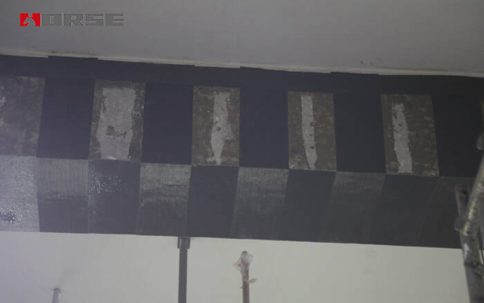 Củng cố chùm bằng sợi carbon tái lạnh fabirc (CFRP)