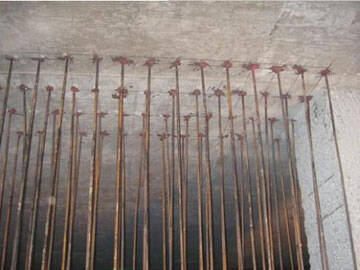 Gia cố tường chịu lực bằng phương pháp mở rộng tiết diện (neo sau khi lắp đặt)