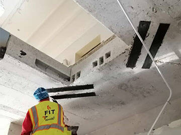 Gia cố tấm bê tông có lỗ hở bằng sợi carbon