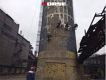 Gia cố bằng sợi carbon trong ống khói có vết nứt và thanh cốt thép lộ ra